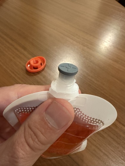 Step 5 - Insert stopper with sleeve into pouch